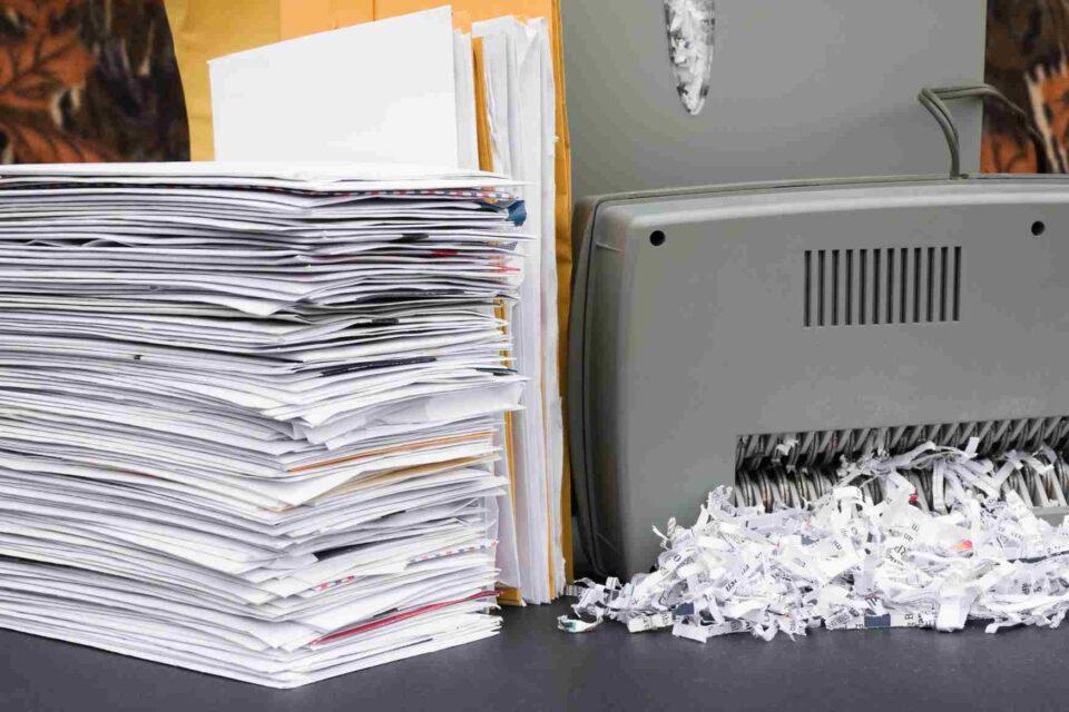 Sensitive Documents Stacked on an Office Desk for Secure Shredding in Tampa Bay, FL